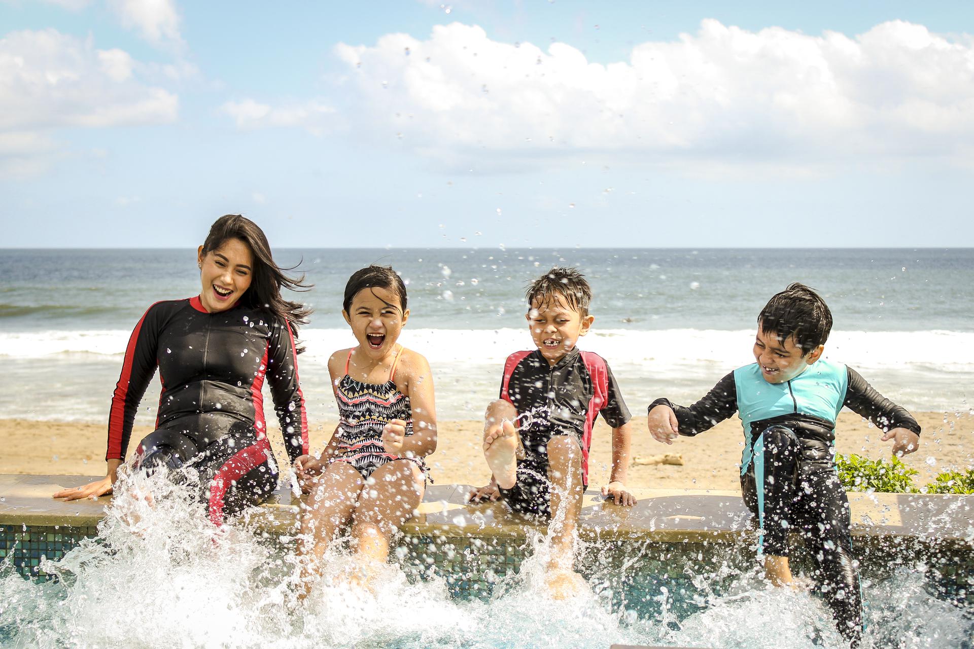 Family Splashing in the water