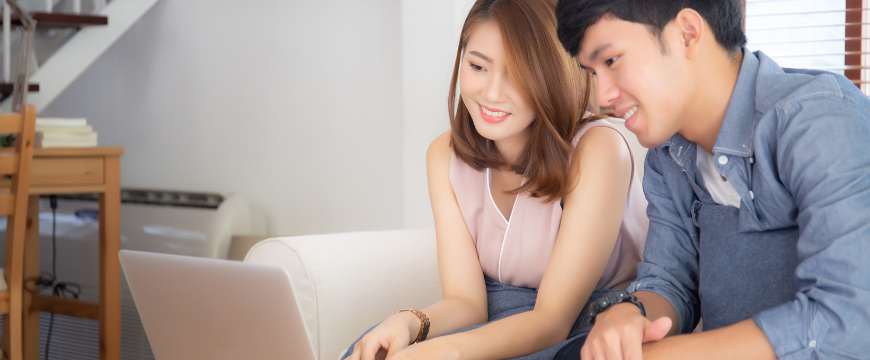 Asian Couple On Computer